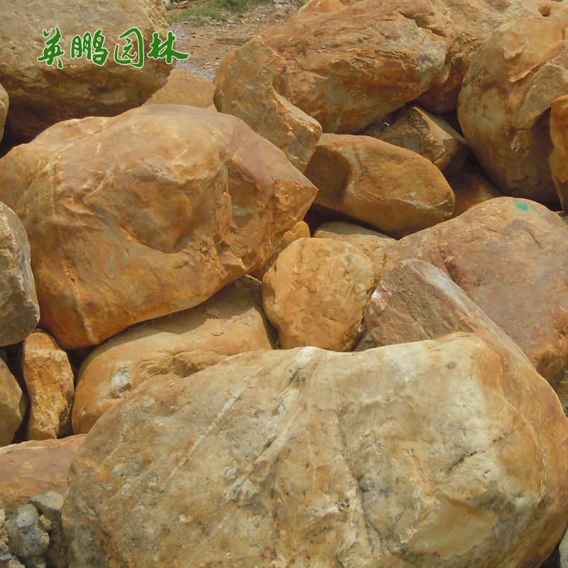  园林黄蜡石 自然吨位点缀黄色卵石 鱼池驳岸围边景观石材厂家供应
